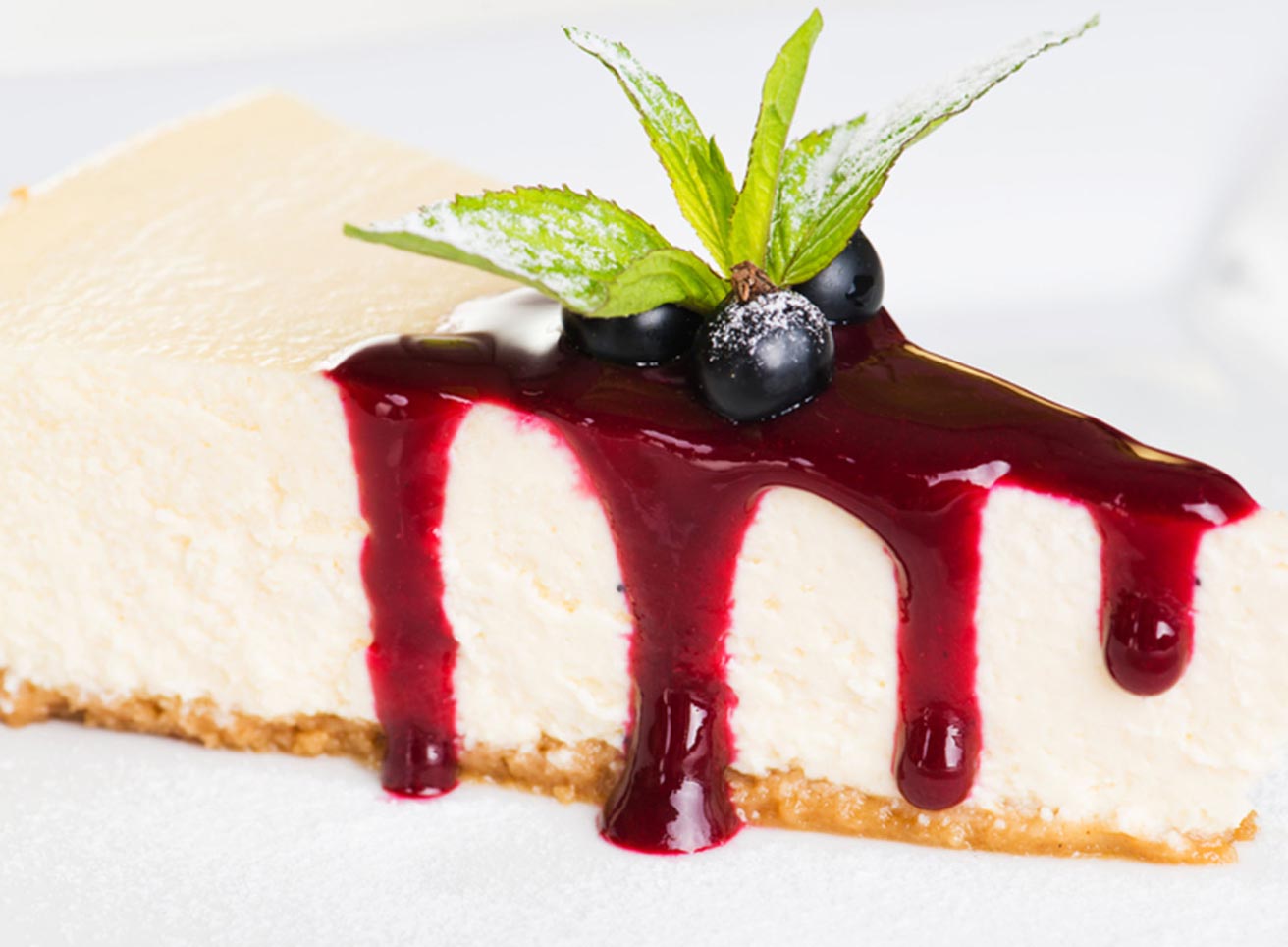 Cheesecake Topped With Blueberry Sauce
