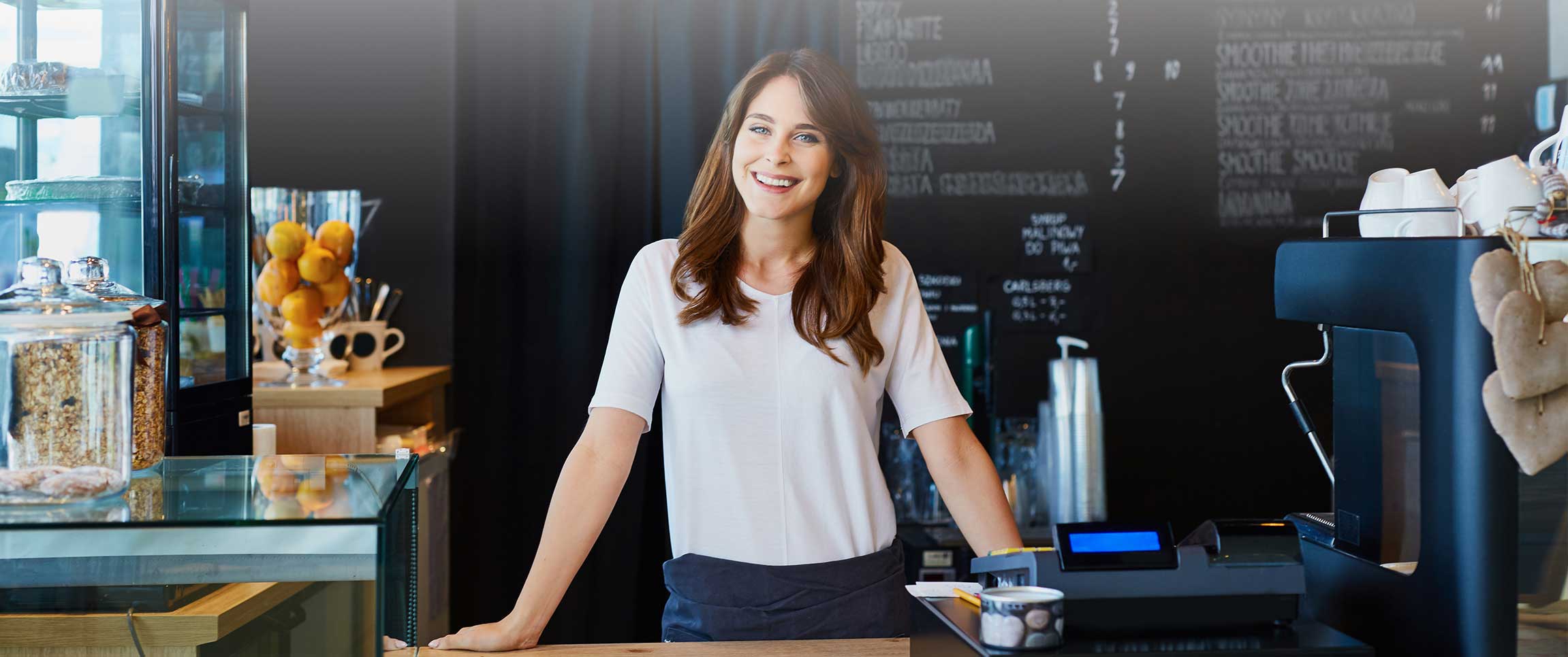 Woman standing at Coffee Shop counter