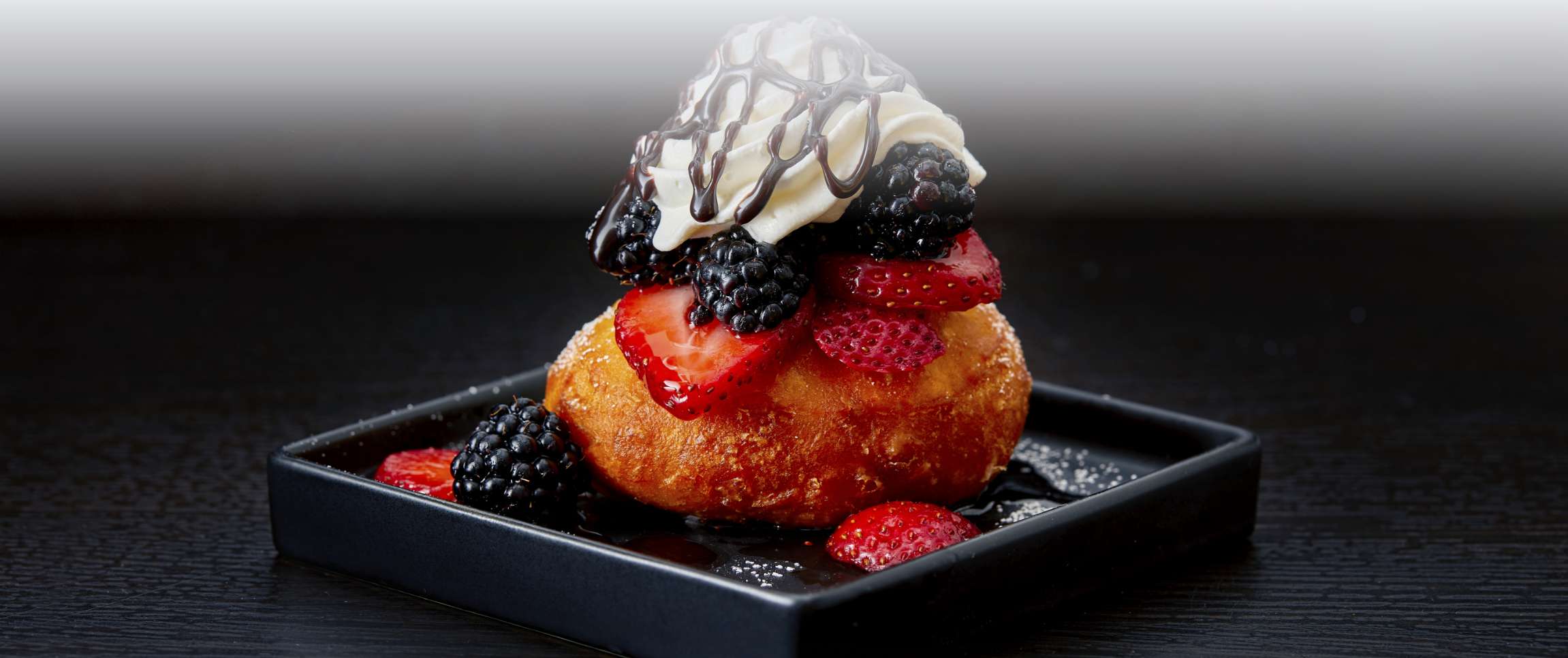 Boozy Berries and Cream Biscuit Donuts