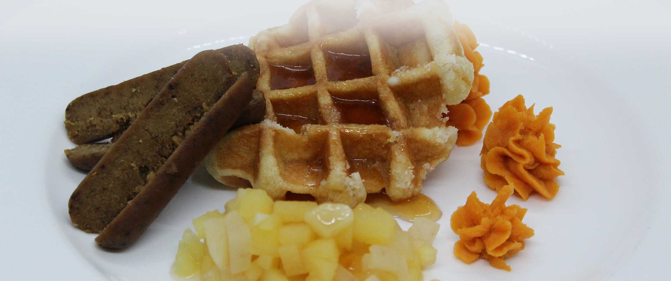 Green Origin Breakfast Link with Sweet Waffle, Cider Poached Apples and Pears, Hard Cider Syrup
