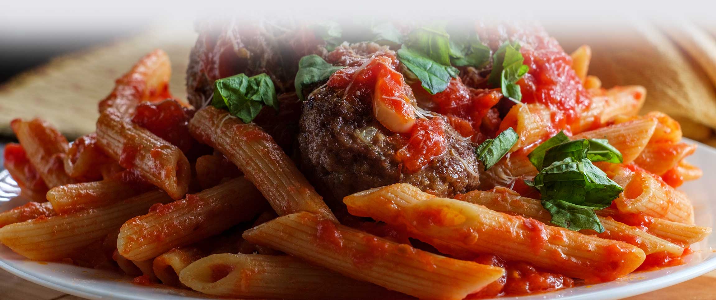 Imported Piancone Penne pasta with Roma Meatballs and Piancone Italian Tomatoes