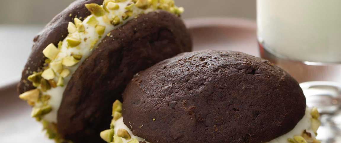 Vanilla Cardamom Whoopie Pies Coated with Pistachios