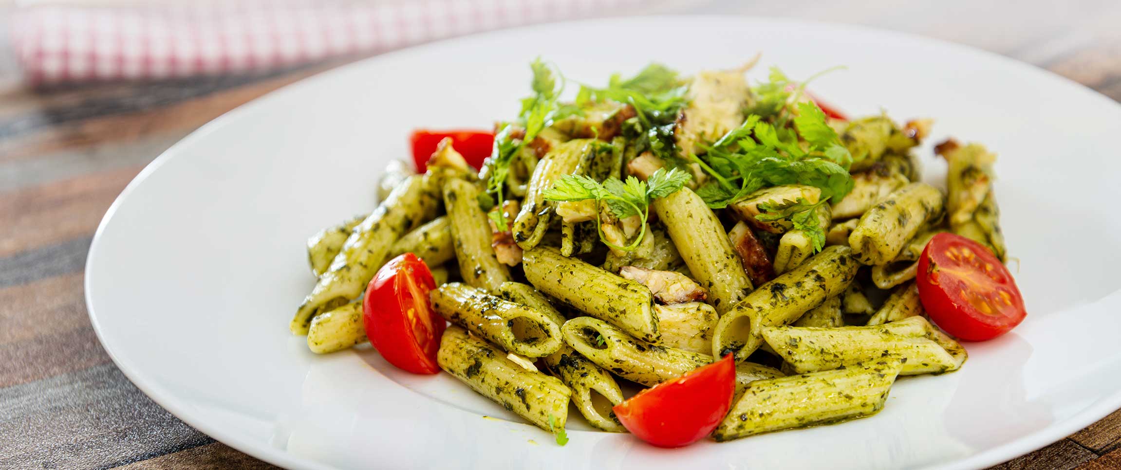 Roma® GF Penne Pasta with Roma® Basil Pesto, Roma® Mascarpone and West Creek® Grilled Chicken