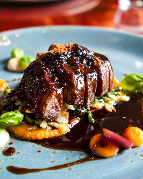 Sauced Ribs atop vegetables